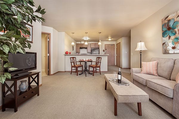 Photo of apartment living room area at Celebre Place in Kenosha WI is a place where residents may live independently and stay involved in all life has to offer.